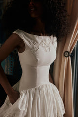 white cotton broderie anglaise boat neck mini dress